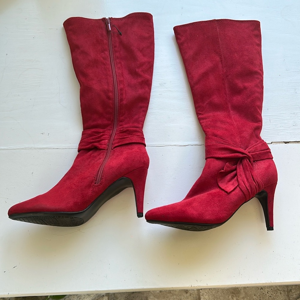 Red high heel boots, faux suede, size 8. About a 3 inch heel. Brand new